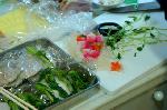餅をいれた汁/お雑煮 : 金時人参・生麩・頭芋・三つ葉