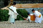 おしたけさん　伏見稲荷大社　火焚祭 : 本殿から持ち運ばれた神火から松明に火が遷される